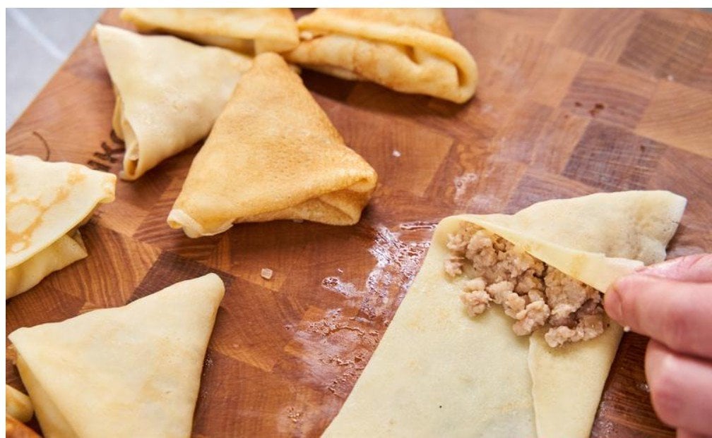 як загорнути млинці трикутником